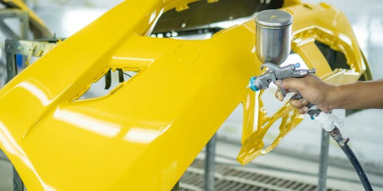 Auto body shop representing garage insurance coverage
